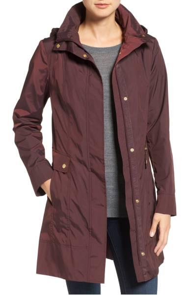 Packable raincoat in aubergine from Cole Haan. Details at une femme d'un certain age.