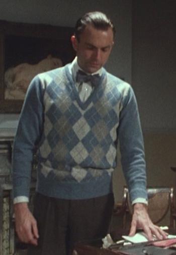 Sidney Reilly’s Blue Argyle Sweater Sidney Reilly’s Blue Argyle Sweater