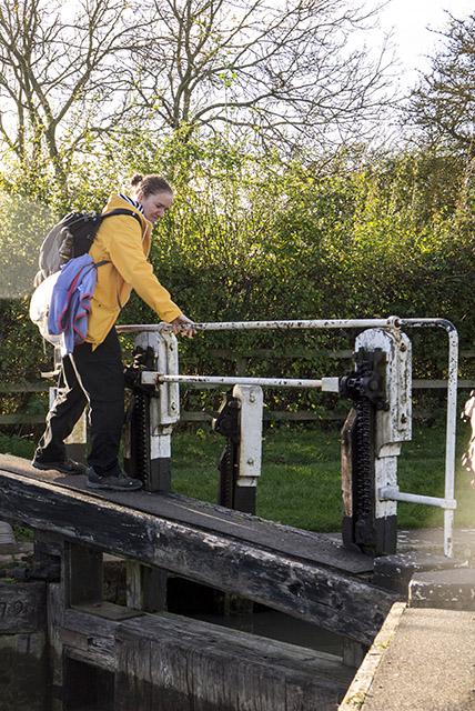 Zoe tentatively crossing the final lock of the day