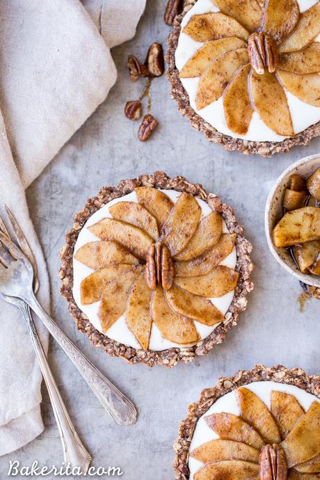These Granola Breakfast Tarts with Sauteed Apples + Coconut Yogurt are an incredible breakfast treat that's so good, you'll think it's dessert! The granola crust is spread with creamy dairy-free coconut yogurt and topped with cinnamon sauteed apples. This gluten-free, paleo and vegan breakfast is the perfect holiday morning breakfast, or to make any morning more special.