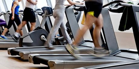 people exercising on treadmills