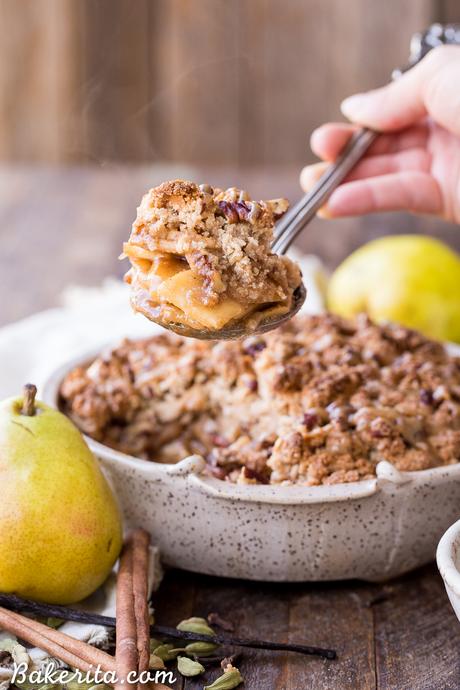 This Caramel Pear Crisp is a decadent and deliciously spiced dessert that's perfect for the holidays. The caramel pear filling is spiced with cinnamon, cardamom, cloves, and vanilla bean, and topped with a crunchy almond flour and pecan crisp topping. Don't forget to serve this gluten-free, paleo, and vegan crisp with some whipped coconut cream!