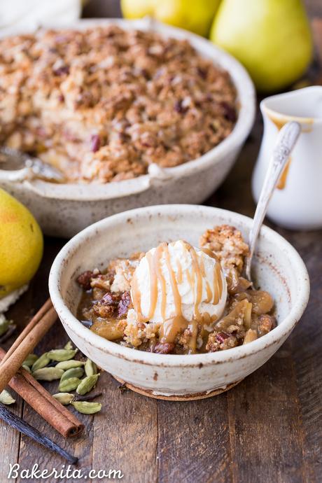 This Caramel Pear Crisp is a decadent and deliciously spiced dessert that's perfect for the holidays. The caramel pear filling is spiced with cinnamon, cardamom, cloves, and vanilla bean, and topped with a crunchy almond flour and pecan crisp topping. Don't forget to serve this gluten-free, paleo, and vegan crisp with some whipped coconut cream!