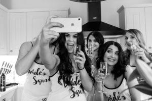 Villa farm wedding photography group bridesmaids selfie black and white