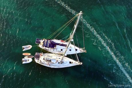 sailboats anchored rafted drone Caribbean