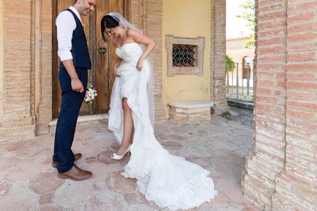 Villa Catignano Siena Wedding Photography bride looks at shoes