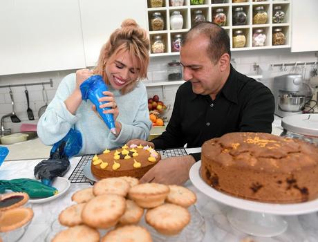 Billie Piper helps owner Lorenzo Khan bake cakes at her local favorite shop