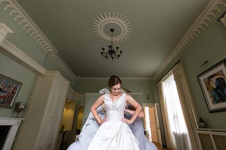 York Wedding Photographers bride getting into dress