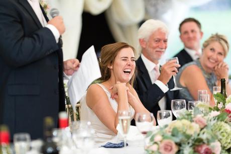 York Wedding photographers bride laughing during speeches