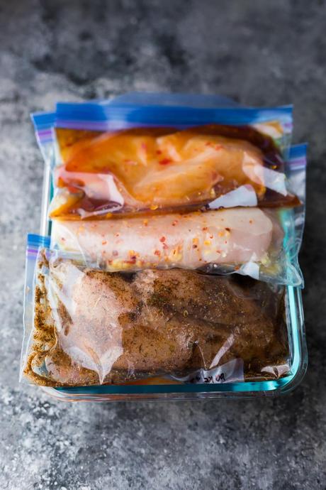 How to marinade chicken, plus 7 marinade recipes. This post shows you exactly how to marinate chicken breasts to get the BEST flavor, and how to freeze them for easy convenient dinners. #chicken #chickenbreast #marinade #freezermeal #mealprep 