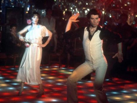 SNFwhite-Gallery1 Sans jacket, John Travolta shows off on the dance floor.