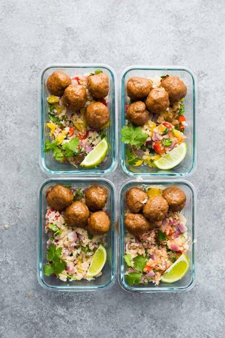 Honey Chipotle Meatball Meal Prep Bowls are the tastiest way to kick start your new years resolutions! Healthy baked turkey meatballs are tossed in a smoky sweet and savory honey chipotle glaze, and served over cilantro lime cauliflower rice.