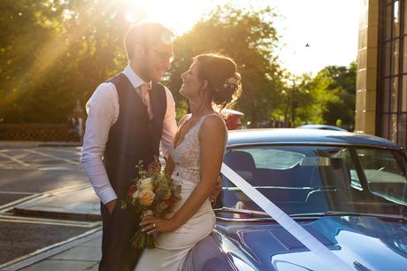 Bride and groom on Jaguar e type york wedding photography