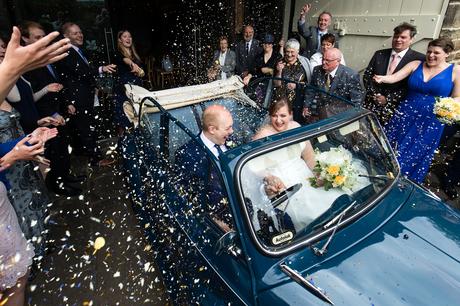 Confetti in convertible car york wedding photography