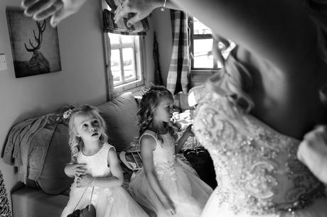 York's best wedding photography flower girl watches bride get ready