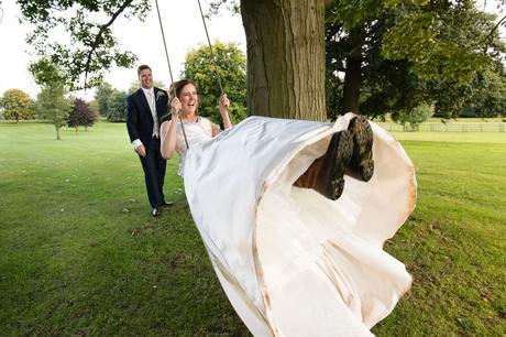 Bride on swing with wellies york wedding photography