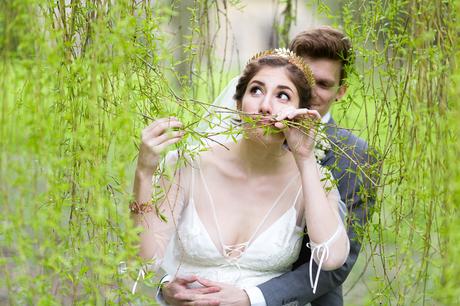 York wedding photography bride making silly face with tree