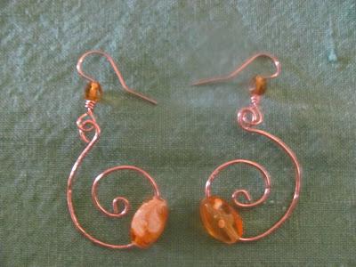 **What is a Designer Hammered Copper Earring?**