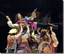 Kevin Earley as The Pirate King with Pirates. Photo Courtesy of Peter Coombs and The Marriott Theatre.