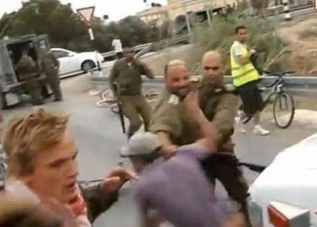 Viral video: Israeli army officer smashes Danish pro-Palestinian protester in face with rifle