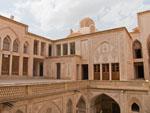 Main courtyard of Abbasian Historical House, a wind catcher is visible