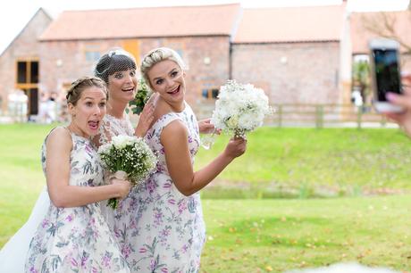 York Wedding Photography at Barmbyfield Barns bridesmiads making silly faces