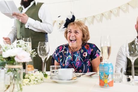 Groom's mom laughing during speeches