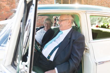 grandparents in classic car