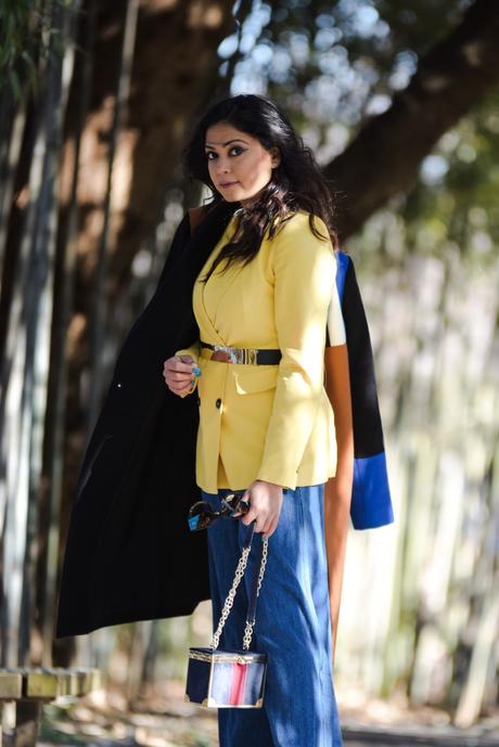 LAYERING 101- essentials you need to bundle up in style, winter layering, winter outfit, wide leg jeans, yellow double breatsed blazer, metallic stretch belt, pinty toe sock boots, colorblock coat, myriad musings , saumya shiohare 6
