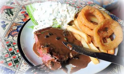 Steak with Whiskey Peppercorn Sauce