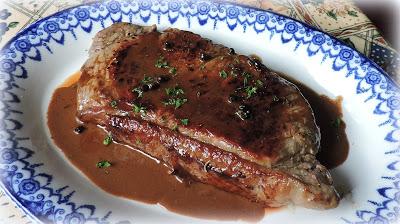 Steak with Whiskey Peppercorn Sauce