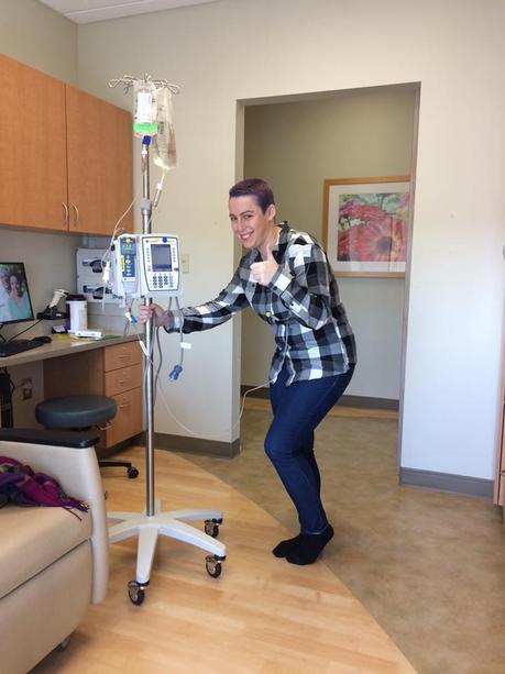 The author posing at the chemo infusion center with that creepy stick thing they put IV bags on.