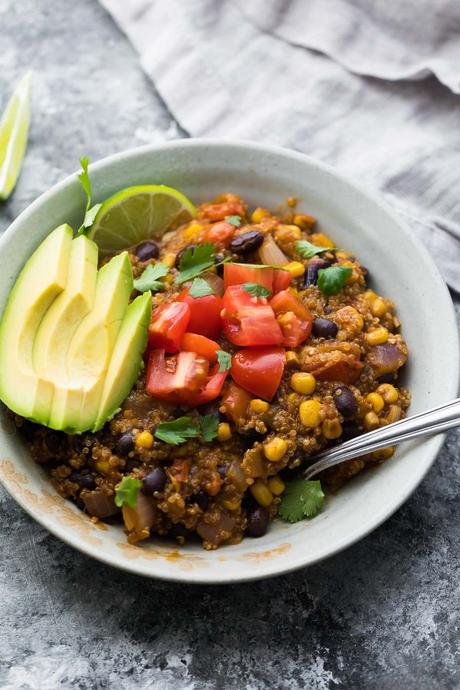 Instant Pot quinoa enchilada casserole is a delicious and easy weeknight dinner! Prep freezer packs for a convenient freezer Instant Pot meal. Vegetarian, gluten-free, and easily made vegan!
