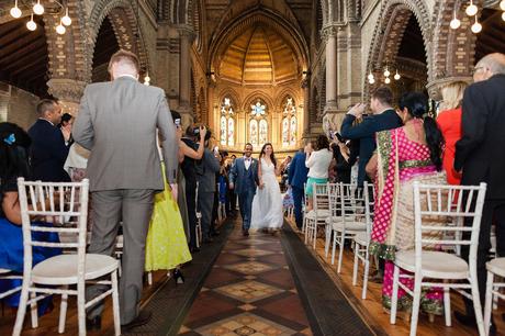 St. Stephens Hampstead Wedding couple walk up ailse