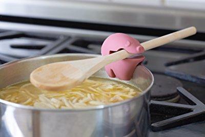 Image: Fox Run Pig Pot Clip/Spoon Holder | Made of heat-resistant silicone | Attach to edge of pot and slide spoon into holder