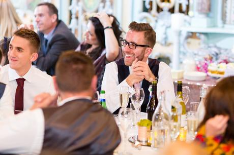 Preston Court Wedding Photography guest laughing during the speeches