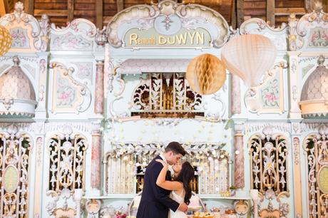 Preston Court Wedding Photography coupel kidd in front of circus wall