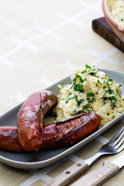 Sausage with creamed green cabbage