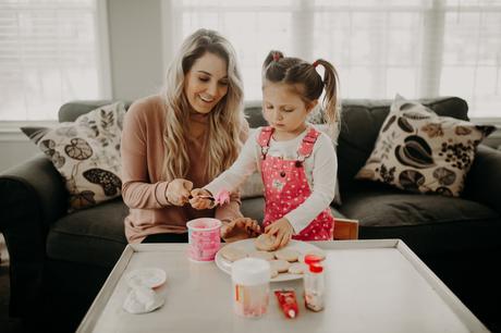 Valentine's Day activities to do with your kids; cookie decorating with sprinkles and icing. 
