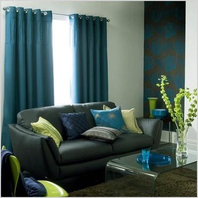 teal curtains gray couch