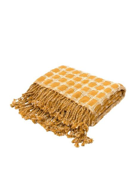 Make your home a cozy and comfortable haven Cache Throw in Narcissus & Bright White design by Jaipur