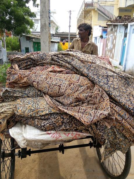 A Kalamkari cloth vendor lost in thought
