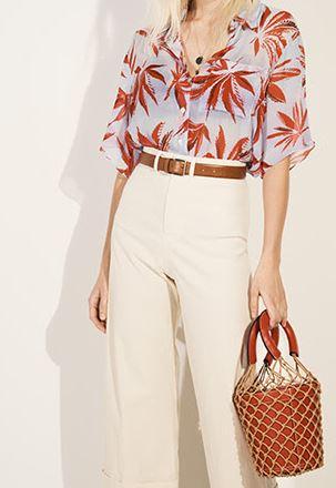 Seer summer sirt with tan leaves styled with off white legged pants and tan belt. A perfect bracelet handle bag via shopbop