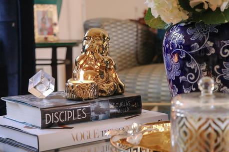 how to style your coffee table, modern living room, round coffee table, nesting coffee table, buddha statue, blue and white porcelain collection, home, interior, decor, coffe table, myriad musings
