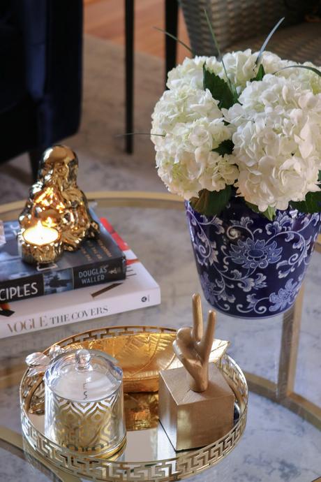 how to style your coffee table, modern living room, round coffee table, nesting coffee table, buddha statue, blue and white porcelain collection, home, interior, decor, coffe table, myriad musings