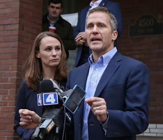 Investigators show up with questions at Missouri's capital city, apparently turning up the heat on Gov. Eric Greitens over his admitted extramarital affair