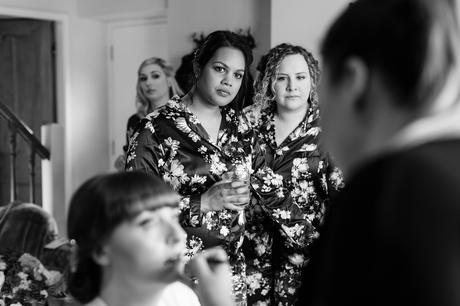 Bridesmaids watching as bride's makeup is being done Yorkshire Wedding Photography