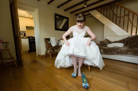 Bride putting her shoes on Yorkshire Wedding Photographer