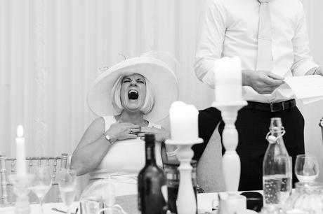 Fun Wedding Photography in Yorkshire brides mom laughs a big laugh during speeches