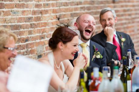 Fun Wedding Photography in Yorkshire groom laughs during speeches